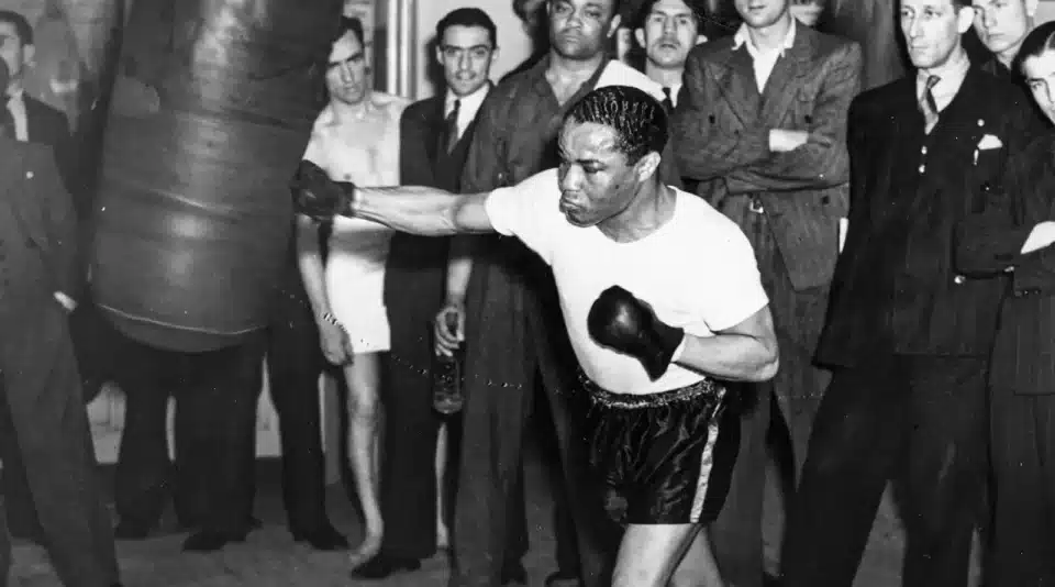 Henry Armstrong overcame a tough start to create boxing history